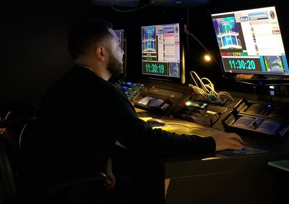 United Teleports operator at a broadcast monitoring station